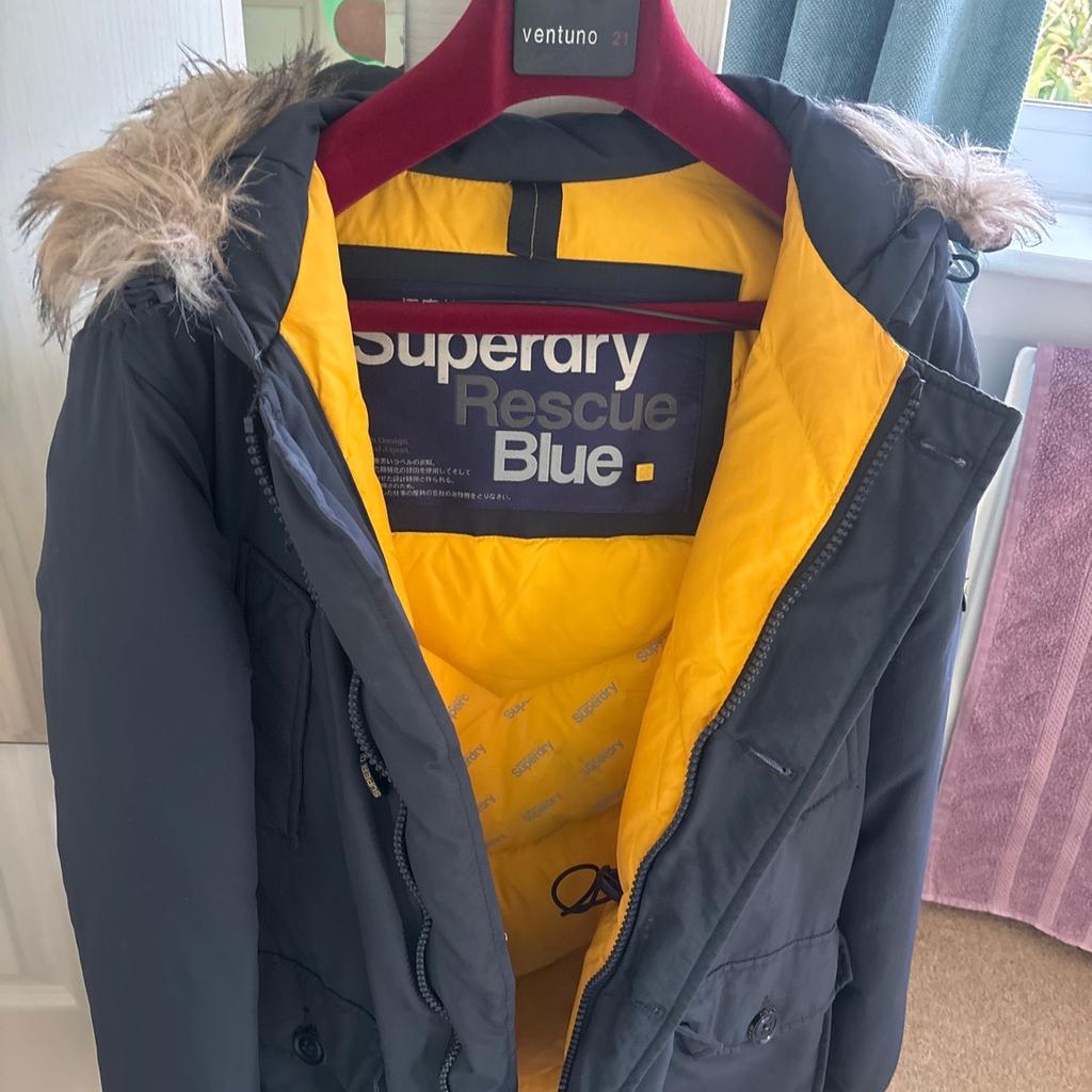 Superdry small men’s grey padded winter parka with fur trimmed hood .
Good condition as only worn few times but two buttons missing need replacing ..Cost over £200