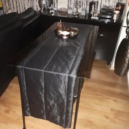 Bespoke wrought iron glass top table
I designed this table it was locally sourced its base is hand crafted black wrought iron and the top is extra thick smoked glass I have used it for a few things I had it made at the right height to sit at, it's been a dining table a hallway display table and originally a nail bar I chose smoked glass as the nail products wouldn't damage the glass and it would be easy to clean. The glass top is not attached but could be done with sucker pads if wanted I never needed to do this though.
measurements are 47 inch long x 24 inch W x 29 inch H
I will include the black table runner if wanted that was £15
So if you would like a piece of furniture that no one else has then this is for you.
It was originally over £400 it does have small signs of wear and tear which is reflected in the price but overall is a beautiful table
it's collection only from Halesowen B63 area.
As it comes in 2 pieces if I dropped the seats down in my car the table does fit in the back 