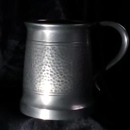VINTAGE TUDRIC ENGLISH PEWTER WARE PARTLY HAMMERED 1 PINT TANKARD 5032.

Rare Vintage Pewter Tankard , 1940's, as the inscription dates as 1949.  Made in England.

Measures approx:11.5cm High - 8.5cm Rim Diameter ~ 10cm Base Diameter.

Any low offers will be ignored or links being sent by scammers; naturally.

Local collection preferred from a safe spot, Tesco Express Tulketh Mill PR2 2BT. Protects both seller & buyer.  Old school 'click & collect'.

Full payment by PayPal incl fees to equal.
