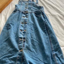 Selection of denim jumpsuits and dresses size 10:12 pet and smoke free home £5 each