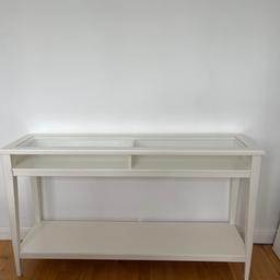 Beautiful, brand-new piece of furniture, glass at the top. Selling because decided that I want all white furniture in the living room.
Measurements: 
Length: 133 cm
Width: 37 cm
Height: 75 cm
                          