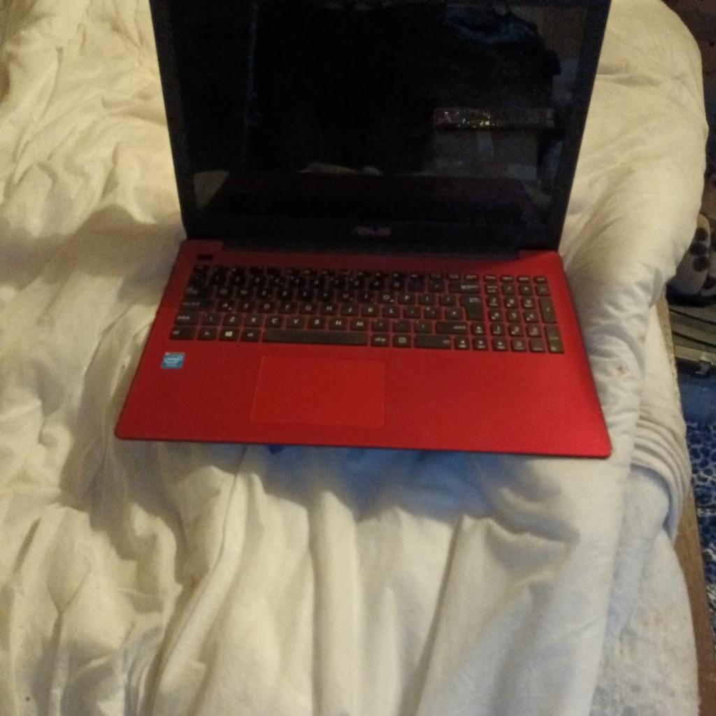 Asus Laptop in full working order but has 2 black marks on screen,works perfectly like new.