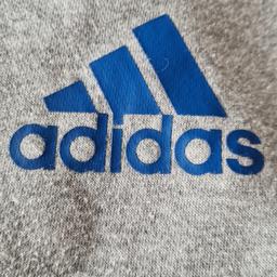 Adidas Mens hoodie sweatshirt grey with blue accents. Well worn but plenty of life left in it. Says xl but more like men's large. I wear Adidas Mens xl but this is a little too snug for me. See photos for condition size flaws materials etc. I can offer try before you buy option if you are local but if viewing on an auction site viewing STRICTLY prior to end of auction.  If you bid and win it's yours. Cash on collection or post at extra cost which is £4.55 Royal Mail 2nd class. I can offer free local delivery within five miles of my postcode which is LS104NF. Listed on five other sites so it may end abruptly. Don't be disappointed. Any questions please ask and I will answer asap.
Please check out my other items. I have hundreds of items for sale including bikes, men's, womens, and children's clothes. Trainers of all brands. Boots of all brands. Sandals of all brands. 
There are over 50 bikes available and I sell on multiple sites so search bikes in Middleton west Yorkshire. hundreds of