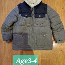 Marks and spencers boys coat. detachable sleeves.