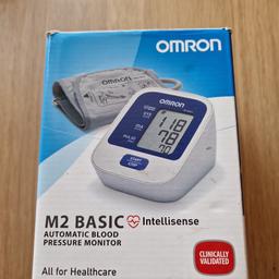 Omron M2 Blood Pressure Monitor with easy cuff 22-32 cm. In good working order.