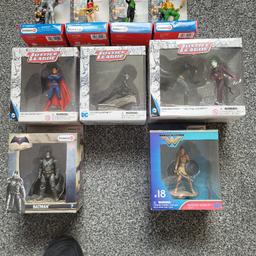 as seen in pics selection of dc and marvel collectable figures ...ones in boxes have never been out ....there's schleich..funko...jaxx Pacific +java metals