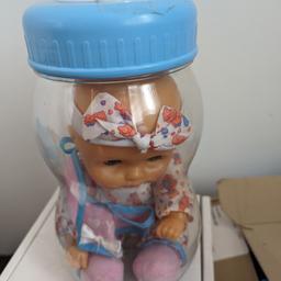 large baby bottle with baby doll
very good condition.
only the top plastic of the bottle has a little crack shown in the last pic .must have happened in storage
it has never been played with just stored and I had forgotten about it
Beautiful piece, Baby doll can be taken out and played with or kept as show piece or for someone to add to there collection