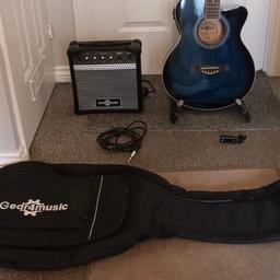 Electro acoustic guitar with practise amp plus all leads, tuner , carry case & stand
