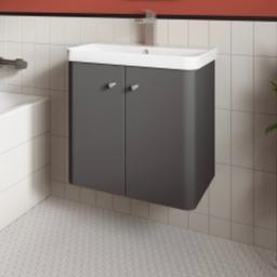 Nuie core 600mm wall hung vanity unit. High gloss anthracite grey. Unit with handles. Brand new but there is a small chip to the finish. that is in the pics. £215 new with the basin. There is no basin with this unit.