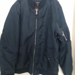 Mens waterproof bomber jacket with zip,been worn but excellent condition got a line of pen inside as shown in pics not sure how it got there..pick up Anfield area or will drop off if you live close by