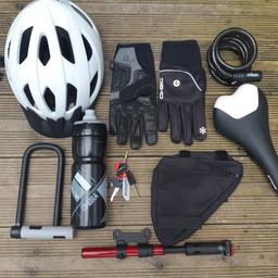Various mountain bike accessories. Adult helmet 58-61 cm. Gloves XL. Waterbottle never used. Pump with extractable hose. 2 locks with keys. Btwin saddle. Phone/mobile phone frame pouch.