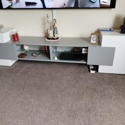 TV unit good condition apart from one door has light damage as shown in the pic measure 91/21/14 white and grey glass shelves has led lights, collection only the cupboards can be taken off for transport 