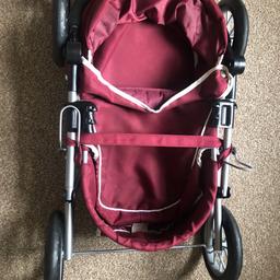 Silver cross toy pram. Includes bag (stud broken). Can be put down for easy storage. Has basket at the bottom and you can move the handle up or down to adjust height.