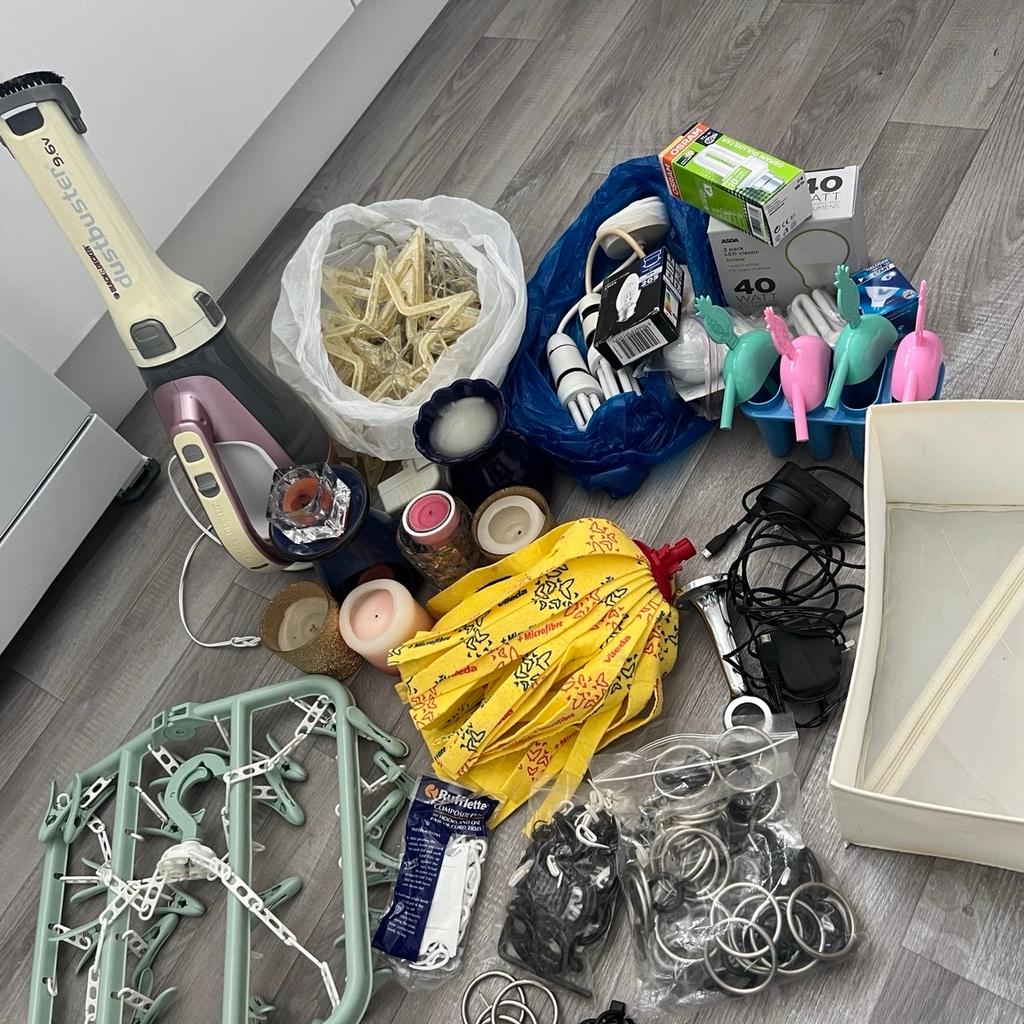 Hand hoover, Christmas lights, many new bulbs, candles a candle handle , new villeda mop , storage , ice cream cube , laundry hanging, window curtains hanging stuff, chargers etc
All great condition, working good