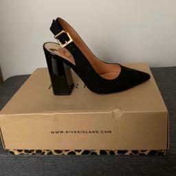 Brand new, never been worn.
Black block heels