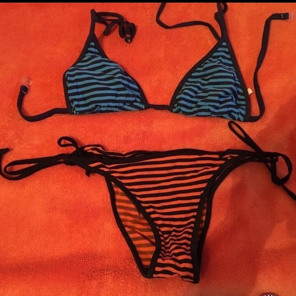 Gr M&S gestreifter Bikini blau/orange
Hose S - Oberteil M