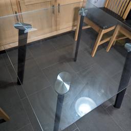 Black metal legs, glass top square table, only used it for a few and decided against glass. Still has original stickers on