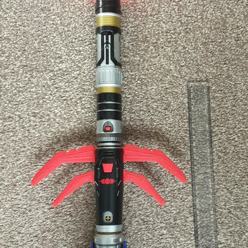 Lightsaber sword
The ruler next to it is 38cm long which gives you an indication the length of the lightsaber

lights up
sounds
2 attachments
can be extended and de-extented

collection only