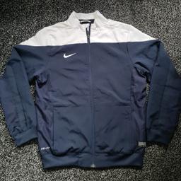 original nike
tracksuit top/ jacket
size M. 10-12yrs
fully lined with zipped pockets

in like new condition as hardly worn
from pet and smoke free home.

can post