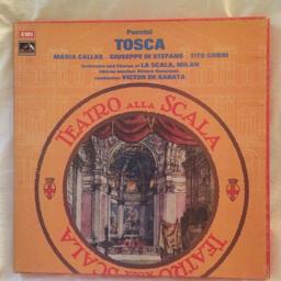 This HMV 2 x LP box set of Puccini's famous opera, Tosca, is conducted by Victor De Sabata and features the stunning vocals of Maria Callas.
This rare UK vinyl box set was released on the red His Master's Voice stereo label with the catalogue number SLS 825, EMI ASD 2797-8.
It contains the original 40 page booklet with synopsis, libretto in Italian and English translation.