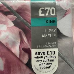 New in packaging, grey with pink flower print,  king size duvet set. No offers