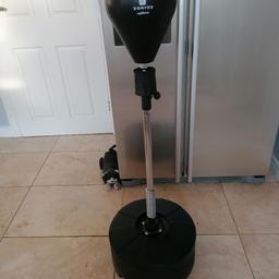 Punch ball with adjustable height fill with sand/water with boxing gloves. Nice item. Buyer to collect please
