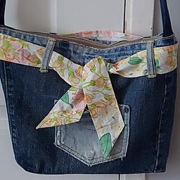 for sale this lovely hand made Jean bag with inner lining.
inside pocket and 2 outside pockets.
ideal Xmas present