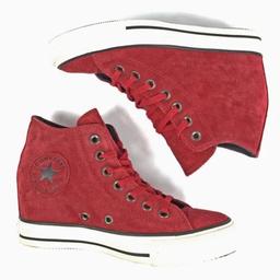 Converse Chuck Taylor Dahlia Wedge Red Suede Lux Sneaker Shoes Womens UK 5 

SUEDE LEATHER!!! - Red, Black and White leather mid top wedge Sneaker Shoe - Classic look 

In good pre-owned
condition.
Velvety soft suede leather uppers in a rich
deep red. Classic Chuck details, white rubber
bumpers, all star patch on the ankles, flat cotton
blend laces in monochromatic red.
Hidden interior wedge, it's approx 2.5" high.