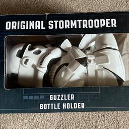 Original stormtrooper guzzler bottle holder. 
This item is new. However, the box is a little damaged