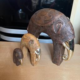 Elephant ornaments in good condition. However, a couple of them are missing their ears.