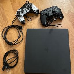 PlayStation 4 slim 500gb plus 2 wired controllers for sale in excellent condition (barely used). Plug is European