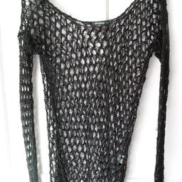 MISSGUIDED Black Stretch grunge Fishnet Top Size 6/8.

Local collection preferred from a safe spot, Tesco Express Tulketh Mill PR2 2BT. Protects both seller & buyer.

Old school 'click & collect'. Can be sent via post, but at extra costs. UK mainland £2.95 P&P.

Full payment by PayPal incl fees to equal agreed price.

I don't do bank transfers or Western Union.

Humblest of apologies.