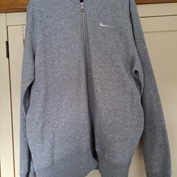 Nike grey top. only worn twice, size L collection Rhostyllen