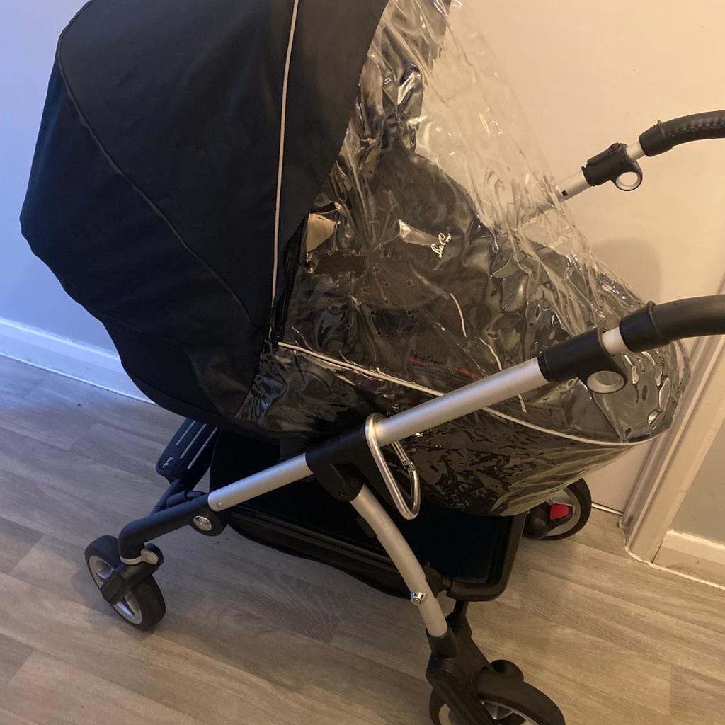> Silvercross wayfarer pram
>Carrycot excellent condition, used only for 3-4 months
> car seat excellent condition, used only 6months
> pram seat good condition
> pram frame good condition
> wheels and brakes all working good

> comes with pram & carrycot raincover- some wear and tear on the side: see pic.
> car seat with adapter included.
> pram inside hood the grey xtra sunshade cover loose inside, strap snapped.
> pram bumper bar scratched covered with cellotape but got a brand new bumper bar cover. See pic.