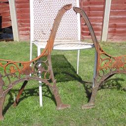 Here we a have a  pair of  garden cast iron bench ends. In great condition. Could do with clean  and a paint, nuts and bolts are very rusty. Ref.  (#784)

  Height........ approx  26.5 inch / 67 cm
  Width........  approx  21.5 inch / 54.5 cm 

Pick up only, Dy4 area. Cash on collection.