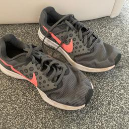 Grey Nike running trainers. Scuff on the back of one. Size 6