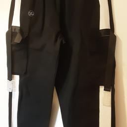 boys/mens baggy trousers(harem style)
elasticated waist, pockets,side pockets, elasticated hem, tassel detail 
Asian size 3xl - UK m (fits 28/30" waist)
collection Uxbridge