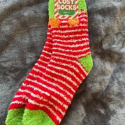 Brand new ladies cost fluffy Christmas socks 
Size 4-8 
£1.50 collect
Hollingwood