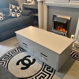 Grey storage coffee table with lift up table so you can eat dinner at it also loads of storage, 2 x large drawers with crystal handles perfect condition cash on collection from Hornchurch Essex JUST DROPPED PRICE NO OFFERS SORRY WAS EXPENSIVE