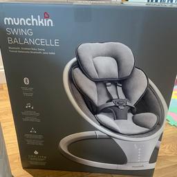Munchkin Bluetooth enabled lightweight baby swing with natural sway in 5 speeds and remote control.
Emulates parents' natural side-to-side sway in 5 distinct speeds. Includes remote control to operate swing speed, sounds and timer.
Bluetooth enabled to play your child's favourite music from your phone. Touchscreen display is smart, intuitive and easy to use.
Lightweight and portable -- easily put together and pack down in seconds for storage or transport. Modern, minimal design in a neutral gray palette.
Seat pad and head support are machine washable and reversible for convenience.
Features music to sooth baby - 12 tunes.
Side-to-side swinging with 5 swing speeds.
Multi-position recline seat for baby's comfort; whether they are playing or taking a nap.
5 point safety harness.
Support strap to keep baby secure.
General information:

Suitable for babies up to 9kg.
Removable washable cover - machine washable.
Batteries required 1 x CR2025 (included).
Mains adaptor included.
Size H47, W66,