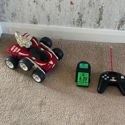 Red remote control 6 wheel all terrain buggycomplete with 6v rechargeable battery pack. Full working condition