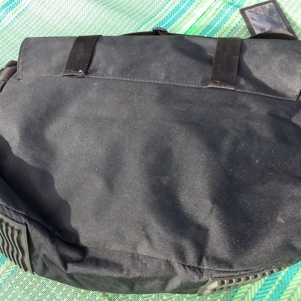 Davidoff Black Canvas Messenger bag from Cool Water promotion. Made of robust canvas, with bottom with rugged rubber mounts to protect it from wear.

Would make an everyday item or use it from travel as a carry on, as strong shoulder strap as well as secure clips.

Approximately 60X40X20cm