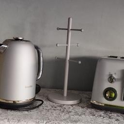here is a breville set which offers a silver metallic grey kettle/ toaster/ mug tree in
the toaster does up to 4 slices of toast and has 9 different settings plus a defrost button
in good working order

comes from a clean smoke free home