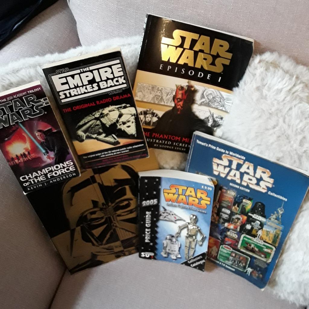 A number of Starwars Books see photos and 2 vhs tapes one is the trilogy with the first 3 films on....can be picked up safely..open to sensible offers....