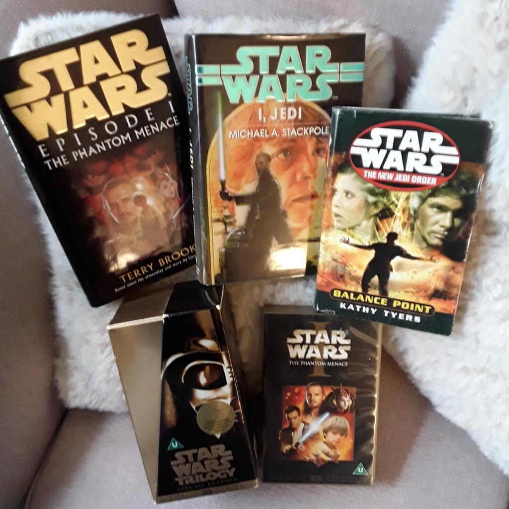 A number of Starwars Books see photos and 2 vhs tapes one is the trilogy with the first 3 films on....can be picked up safely..open to sensible offers....