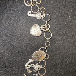 a really beautiful juicy  couture  charm bracelet  . there 4 charms on and you. an always  add more.
offers welcome  and I will post