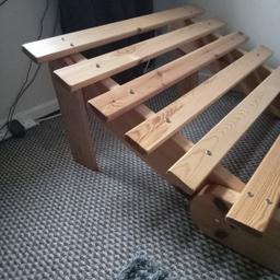 Solid pine single bed base, from futon workshop, excellent condition, from smoke free and pet free home. Buyer to collect.