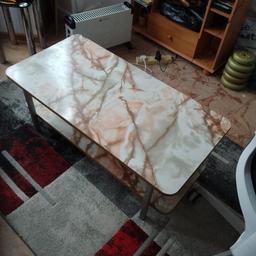 lovely multicoloured marble design table. Great condition. loads of life in it.open to offers. can fit in car nice and light in weight