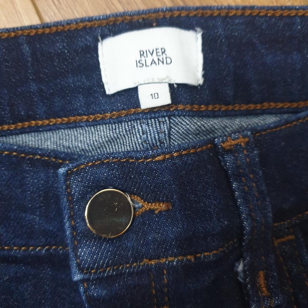 Woman's River Island jeans, size 10, has been worn but in good condition