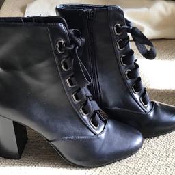 New Miss Selfridge unusual black faux leather 31/2 ins heeled boots
Front lace up ribbon detail (side zip also)
Size 6
Would look great with a dress or jeans
£5 o n o